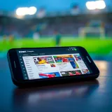 Smartphone displaying a popular online sports betting platform with various football betting options